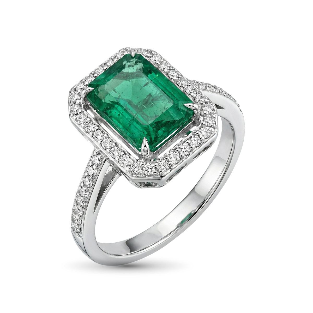 Кольцо из белого золота с изумрудпо и бриллиантами