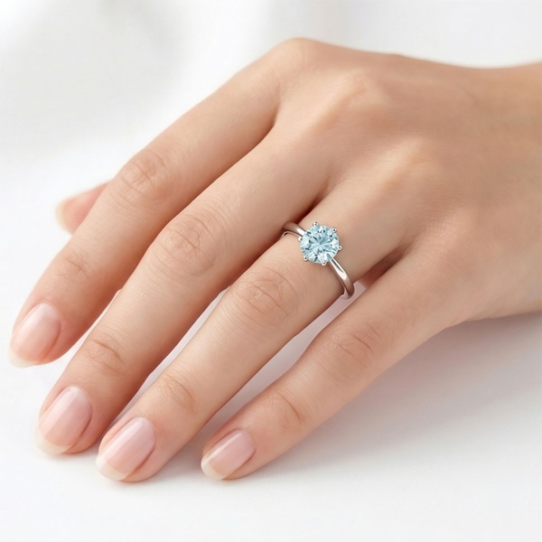 Кольцо из родированного золота с аквамарином