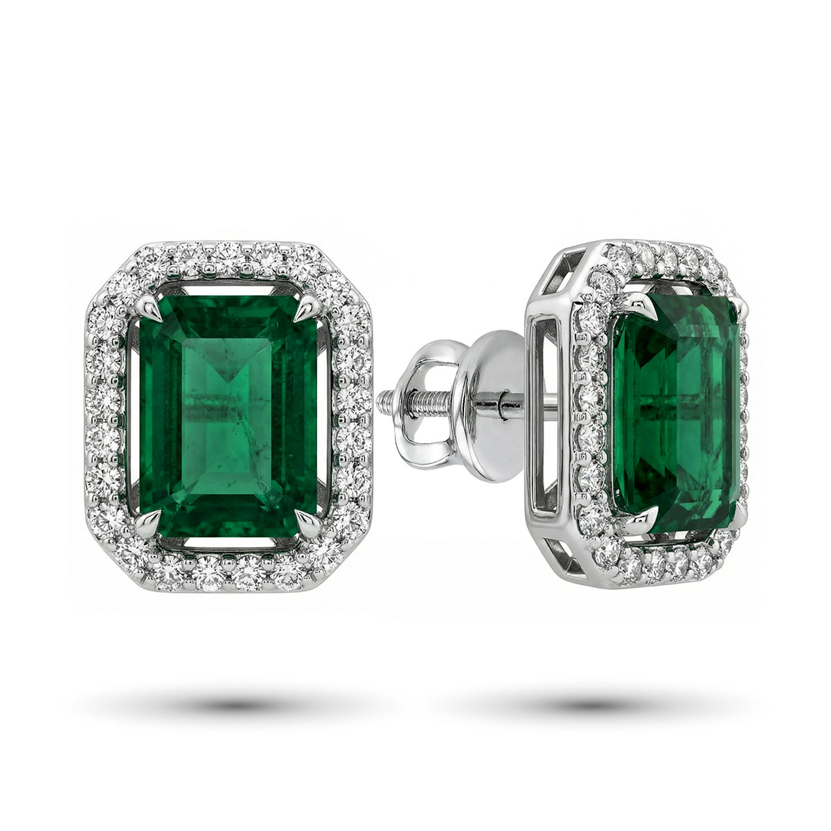 Серьги из белого золота с изумрудпо и бриллиантами