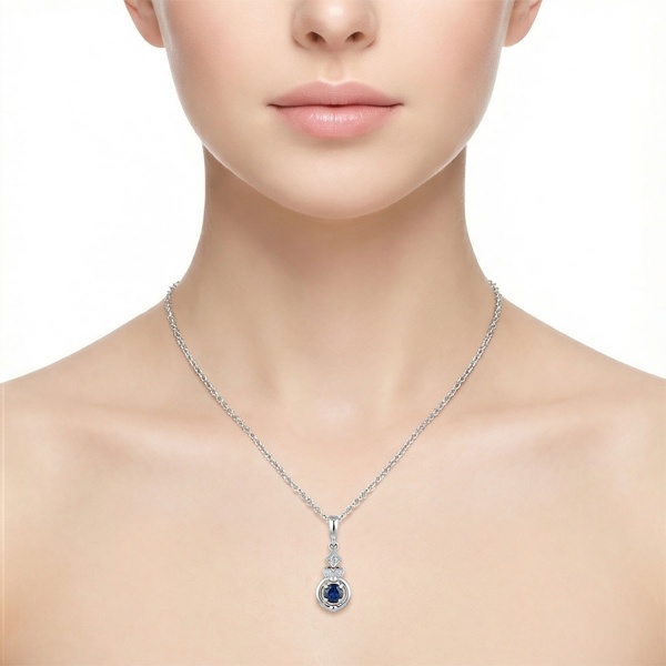 Подвеска из белого золота с сапфиром и бриллиантами