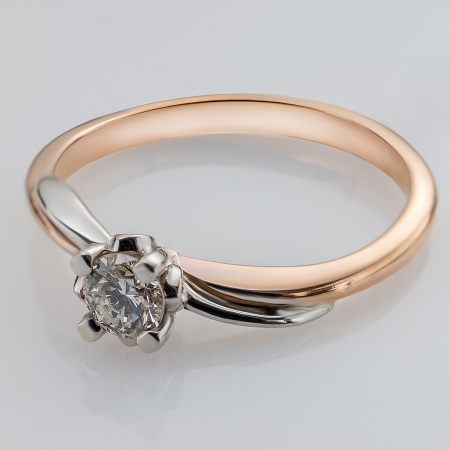 Кольцо из комбинированного золота с бриллиантом